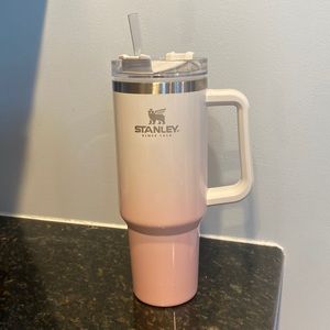 pink and white Stanley 40 oz tumbler